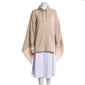 2 Ugg ponchos. Neutral cream color in XL and olive green color in M/L.
